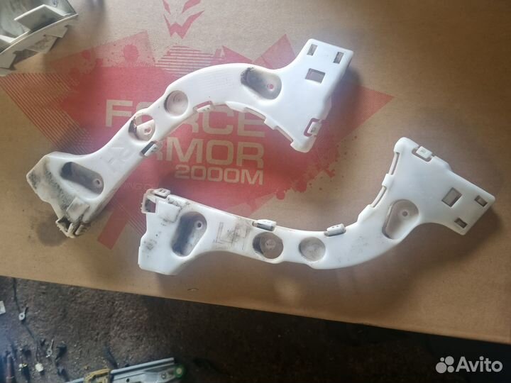 Кронштейн заднего бампера левый Форд Фокус3