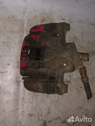 Суппорт тормозной Suzuki Swift (1989-2000)