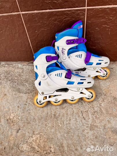 Роликовые коньки