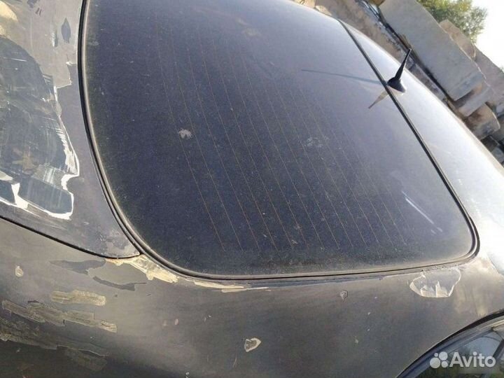 Стекло заднее Toyota Carina E
