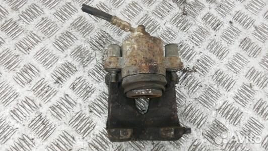 Суппорт тормозной передний левый skoda octavia A4