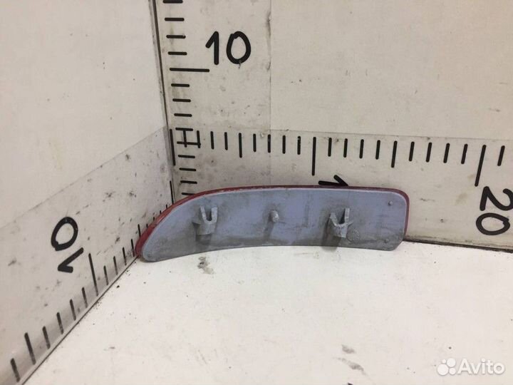 Светоотражатель заднего бампера левый