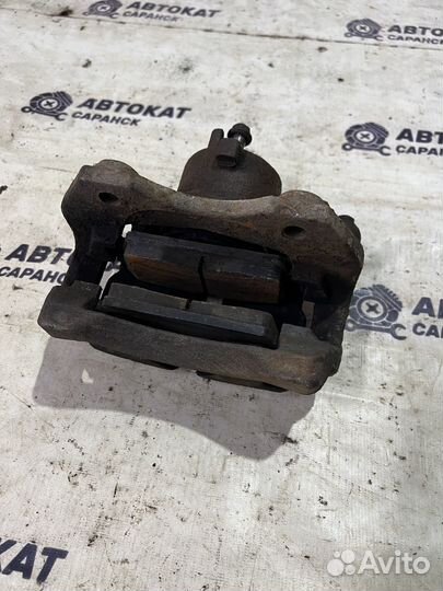 Суппорт передний правый Nissan Primera P11