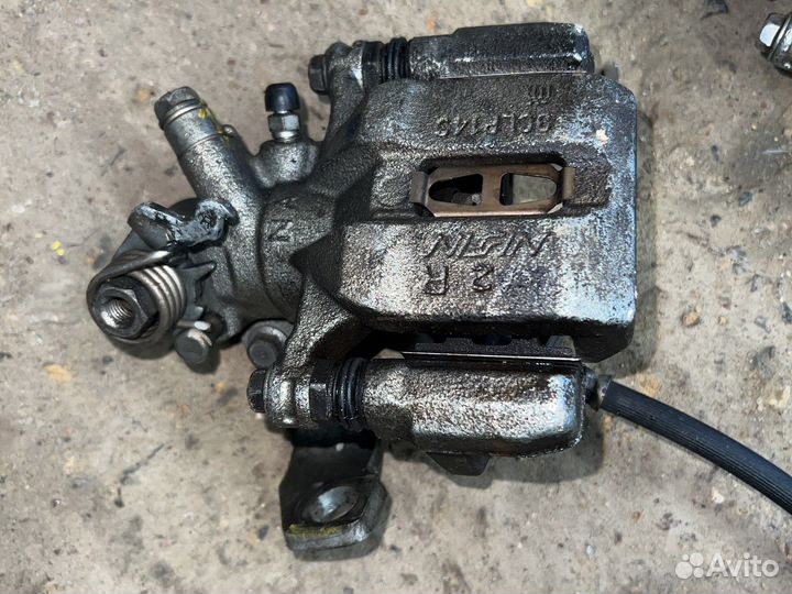 Суппорт задний левый правый honda Civic 4D