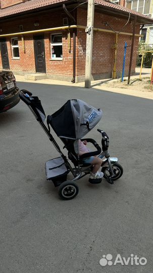 Трехколесный велосипед с родительской ручкой