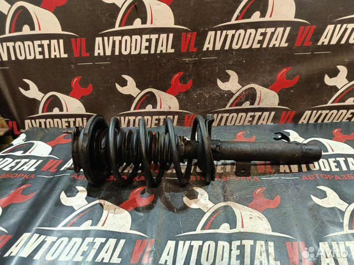 Стойка амортизатора передняя правая Ford Focus 1