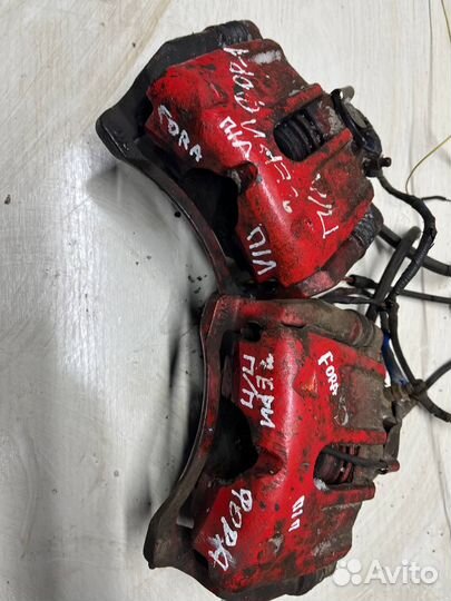 Суппорт передний левый правый Chery Fora a21