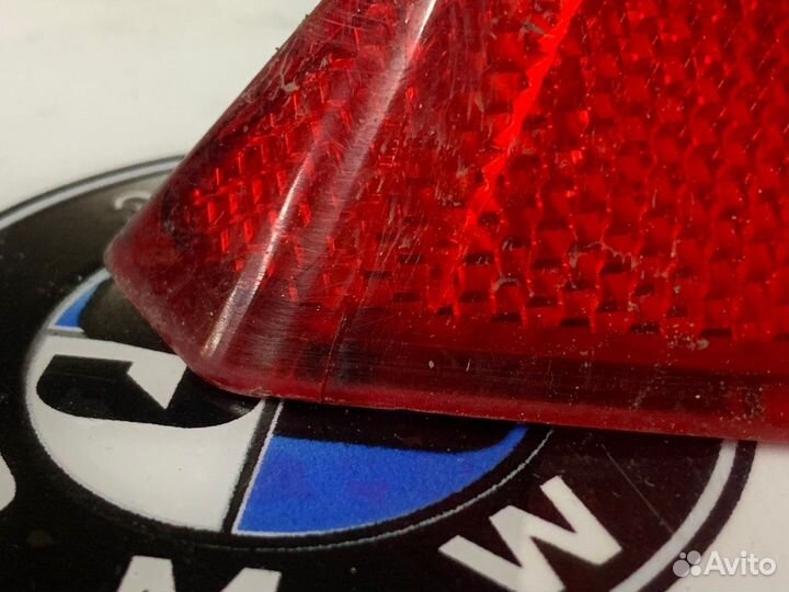 Отражатель бампера правый BMW F07