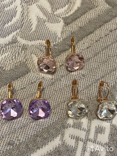 Красивые серьги много