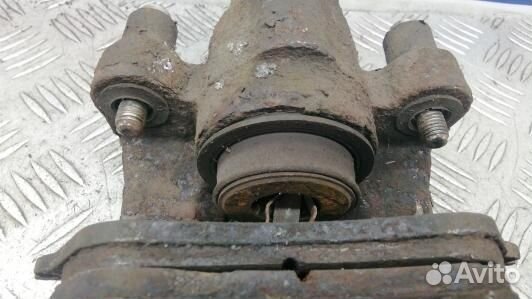 Суппорт тормозной задний правый chrysler voyager 4