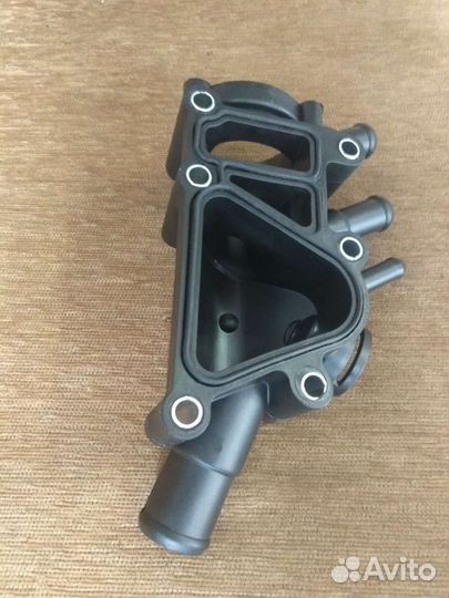 Корпус термостата на Форд фокус 1 1.6л
