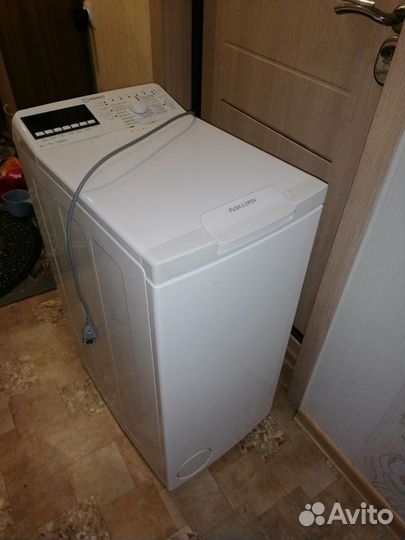 Стиральная машина с вертикальной загрузкой