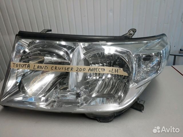 Фара левая Toyota Land Cruiser 200 дорестайлинг