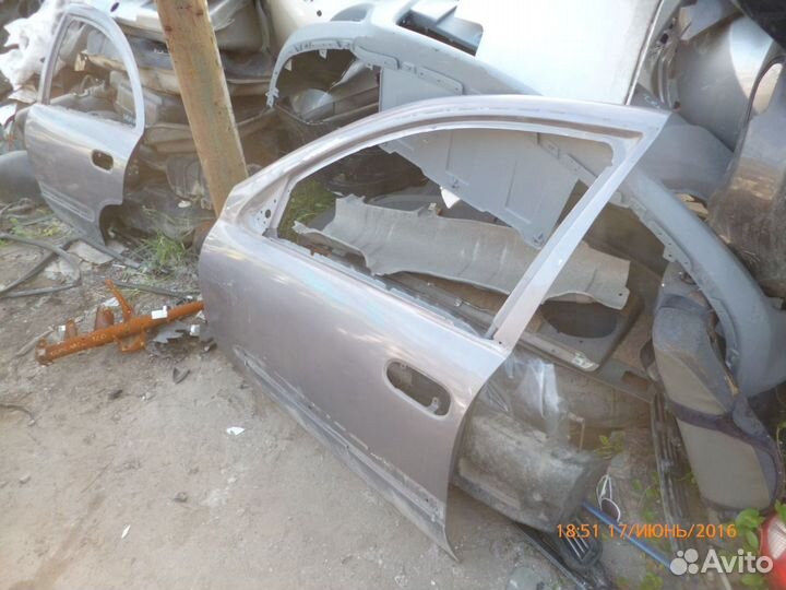 Дверь передняя левая Ниссан Блюберд Силфи