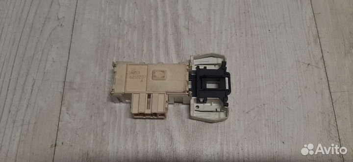 Устройство блокировки люка Candy 41016879 DA053