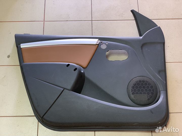 Обшивка двери передней Largus Cross 8450000403