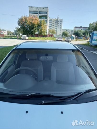 Mazda Familia 1.3 AT, 1999, 100 000 км