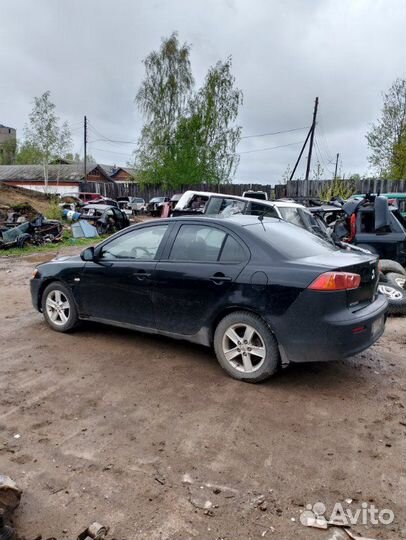 Накладка зеркала внутри левая Mitsubishi Lancer CY