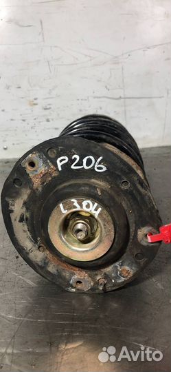 Стойка амортизатора передняя левая Peugeot 206