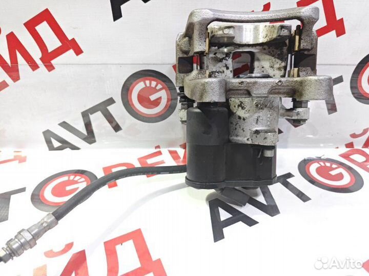 Суппорт тормозной задний правый Volkswagen Passat