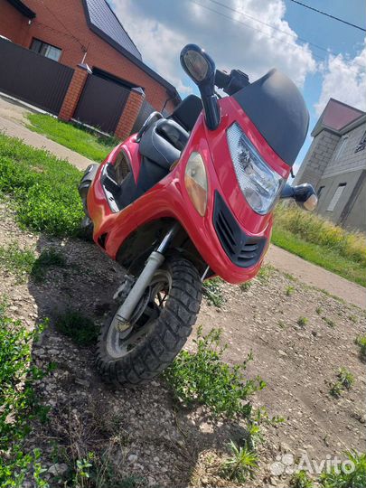 Макси скутер