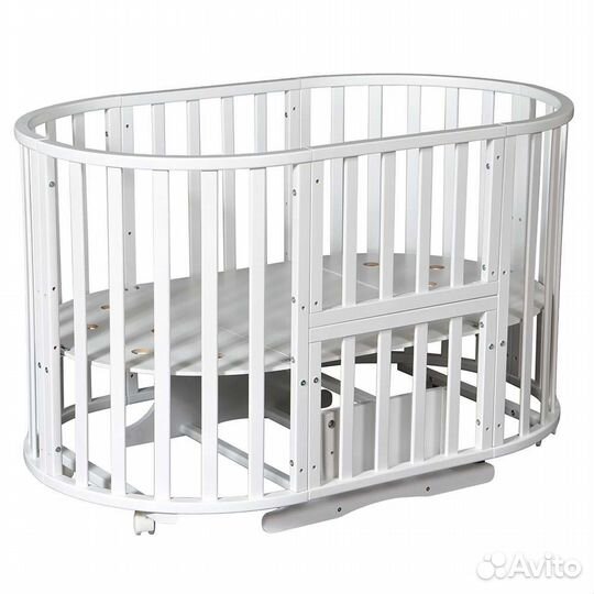 Круглая кроватка с маятником