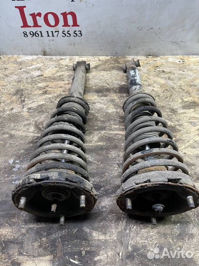 Передняя стойка амортизатор левая Primera P10