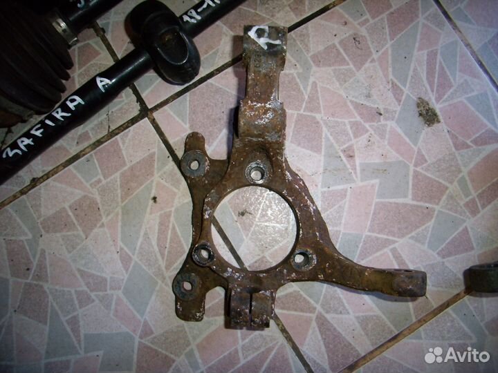 Опель зафира а поворотный кулак правый