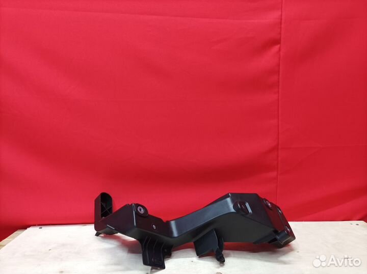 Кронштейн фары правой Jeep Grand Cherokee вк2 2010