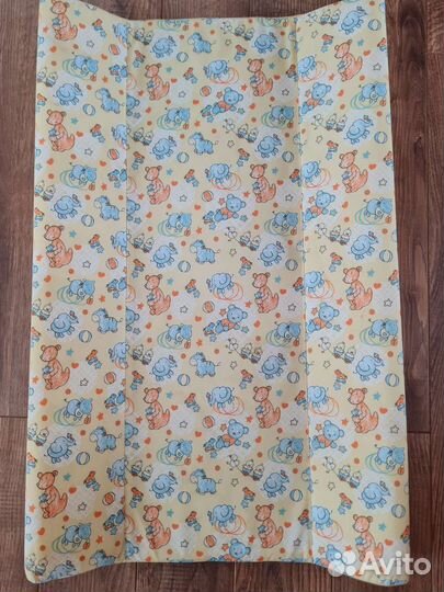 Детская кроватка с маятником