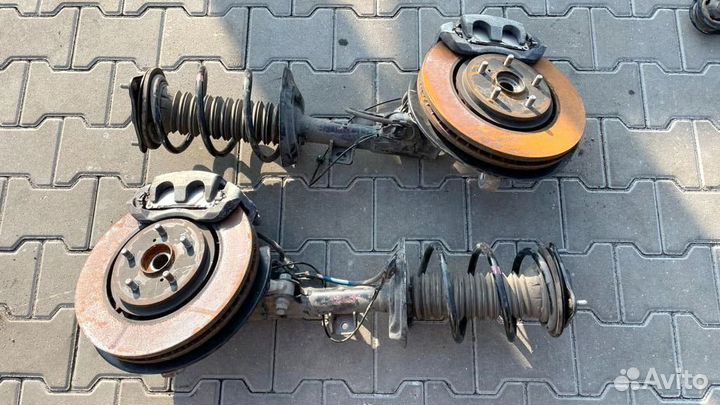 Стойка амортизатора передняя Тойота Рав 4 50 кузов