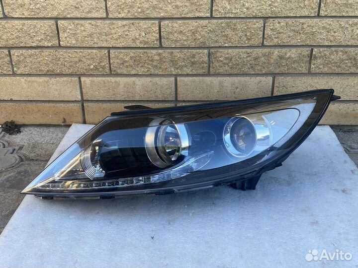 Фара левая KIA Sportage 3 галоген с дхо