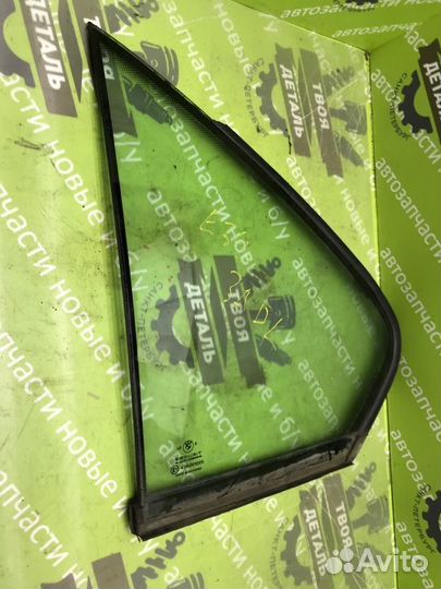 Стекло двери форточка левая Bmw E34
