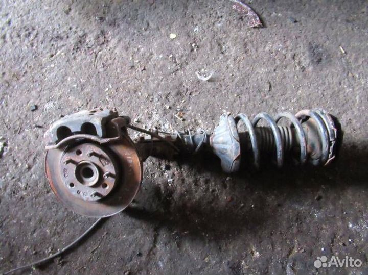 Стойка амортизатора передняя левая Kia Carnival