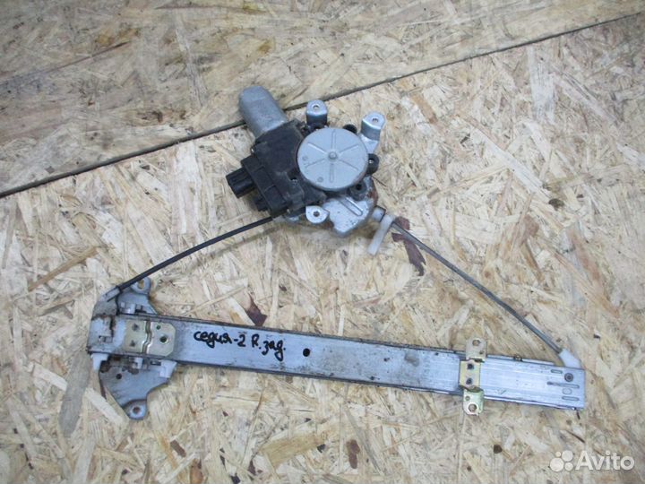 Стеклоподъемник двери Митсубиси Лансер Седия