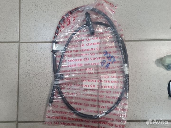 Трос стояночного тормоза левый Zikmar Z59399R