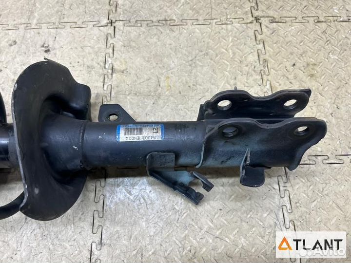 Стойка передняя левая nissan lafesta