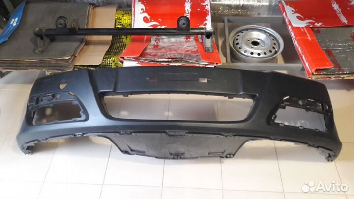 Бампер передний Опель Астра Н 1400303