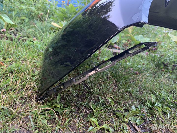 Бампер задний чёрный Opel Astra