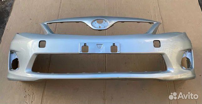 Передний бампер тойота королла е150 серебрисытй