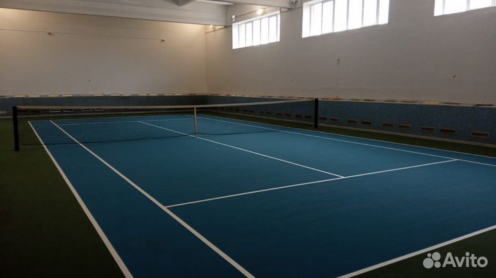 Тренер по большому теннису