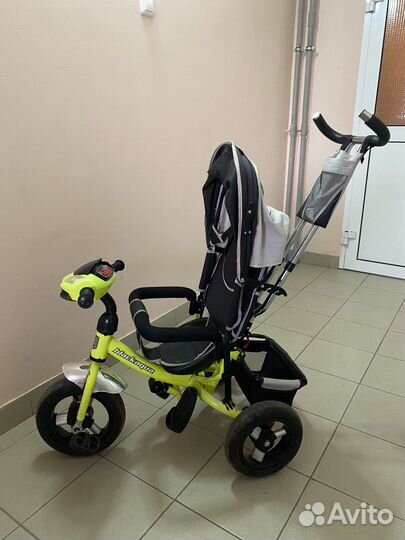Трехколесный велосипед с ручкой