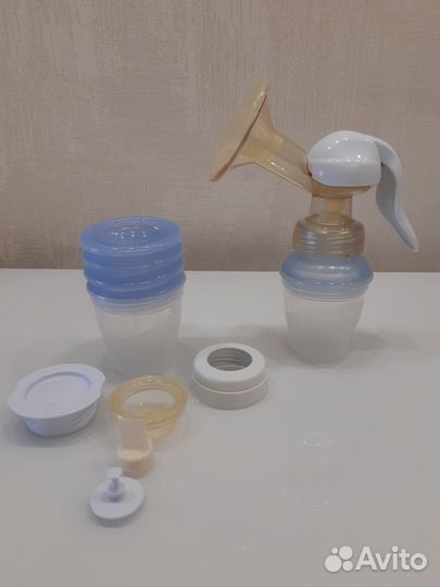 Ручной молокоотсос с системой хранения молока