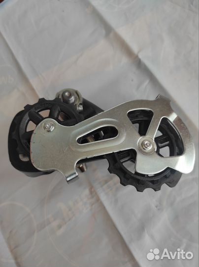 Задний переключатель Shimano Altus 7 скоростей