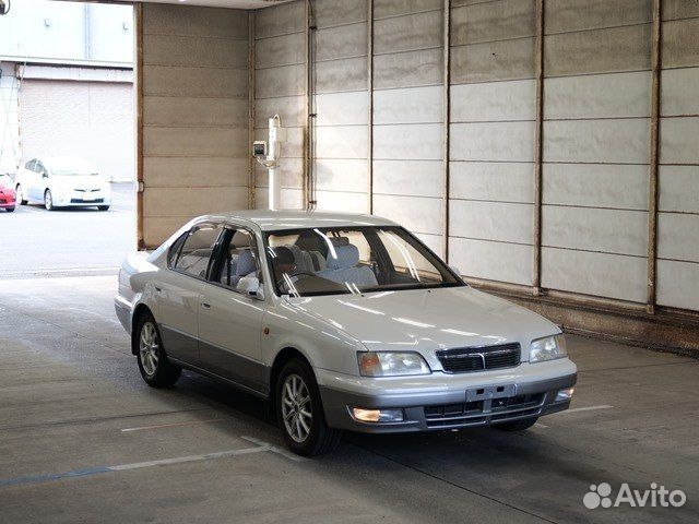 Замок задней правой двери Toyota Camry SV40