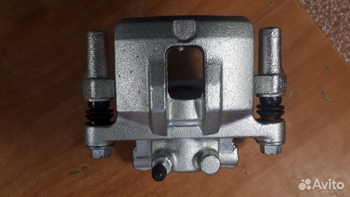 Суппорт задний Мицубиси Лансер 9