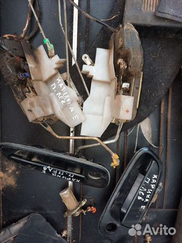 Замок двери Тойота карина е 1996г