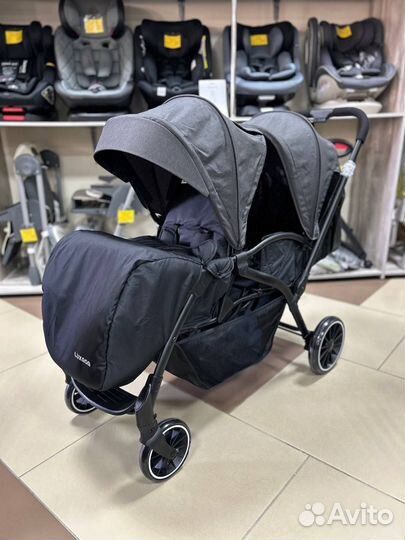 Прогулочная коляска для двойняшек