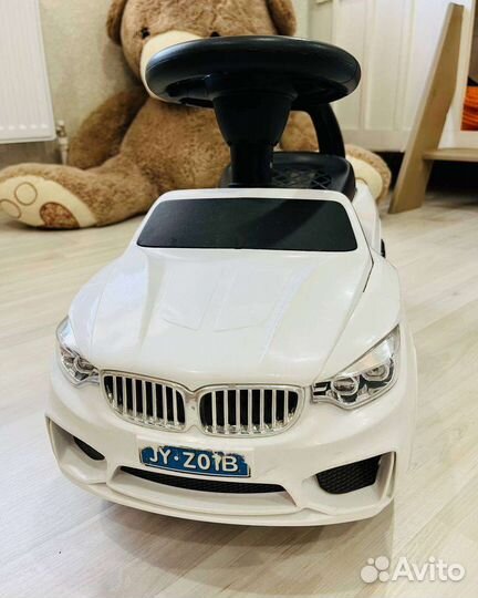 Машинка каталка bmw