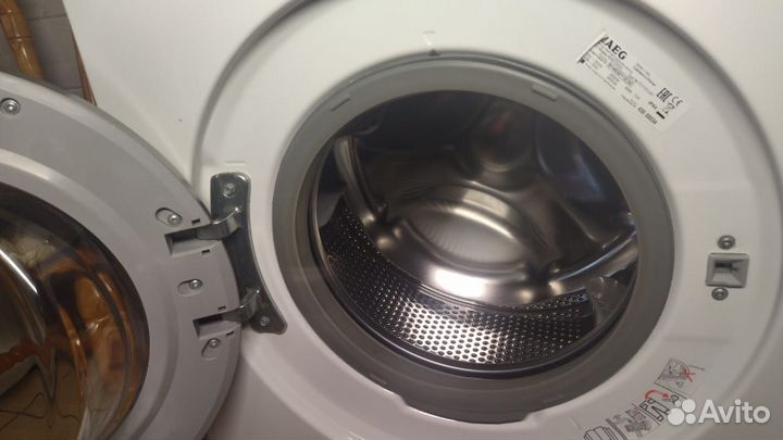 Узкая Стиральная машина AEG AMS 7000 U на 6 кг